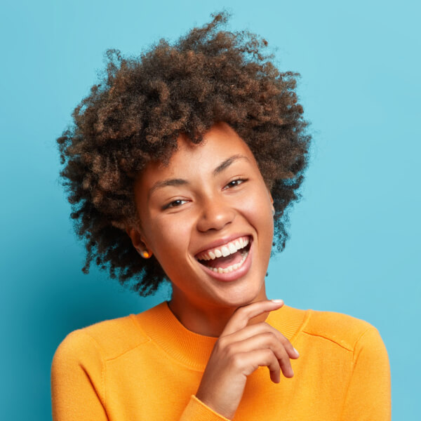 portrait of glad young afro american woman laughs 2021 08 31 09 15 33 utc 1 1